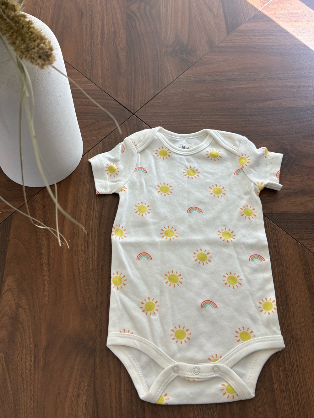 Primary One-Piece Bodysuit with Yellow Sun & Rainbow Prints